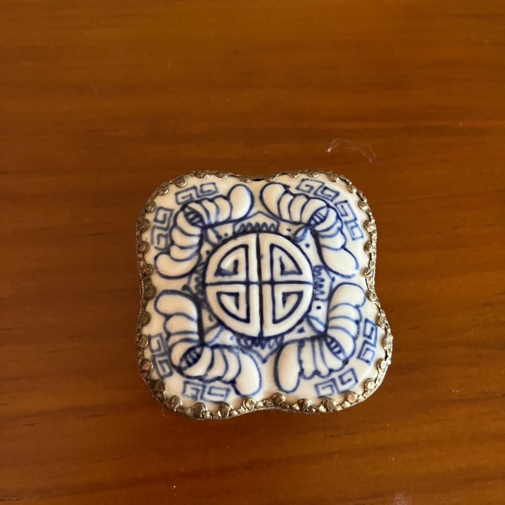 Chinese Silver plated trinkets pot with porcelain lid.